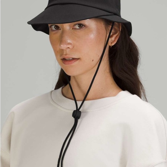Lululemon Black Bucket Hat.Adjustable Chin Strap and Sweat Wicking Fabric. XS/S - Picture 1 of 9